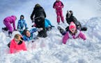 Students at Paideia Academy love it when the snow falls. For recess, they get to bundle up in their snowpants, boots and mittens and leap off of, or r