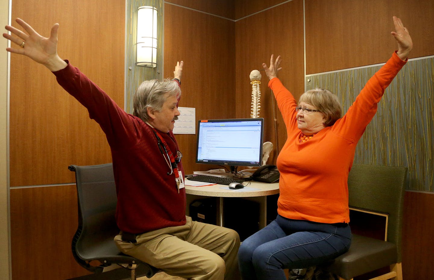 Carol Johnson made a visit to Dr. Alfred Clavel at the HealthPartners Riverway Clinic Thursday, March 24, 2016, in Coon Rapids, MN. Johnson has gained strategies including self-hypnosis to manage pain from fibromyalgia and overcome her growing reliance on prescription opioids. Here, Johnson did some stretching and range of motion exercises with the help of Dr. Clavel.](DAVID JOLES/STARTRIBUNE)djoles@startribune.com Just saying Americans need to make due with fewer addictive opioids for pain reli