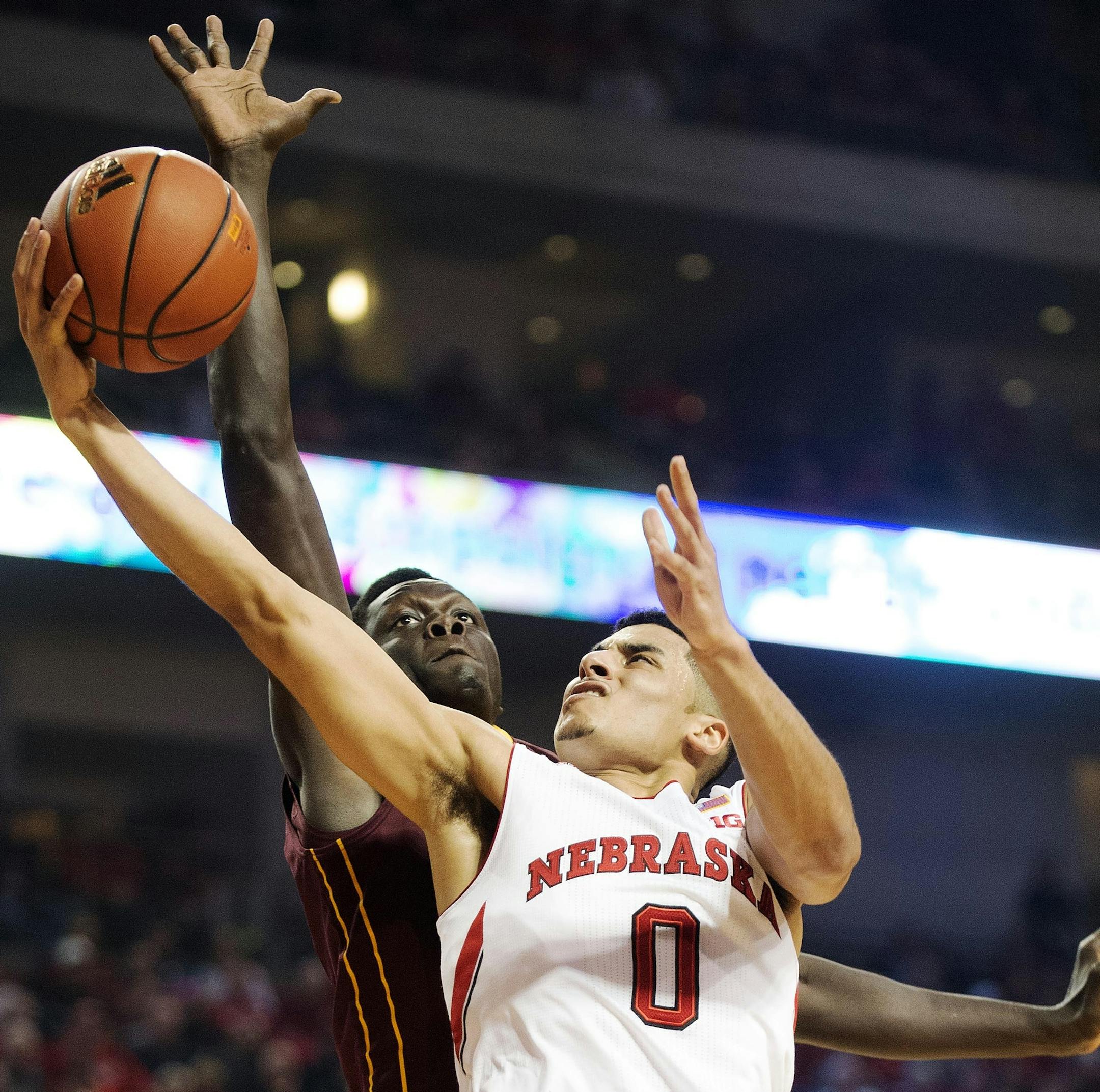 Nebraska guard Tai Webster (0) drives to the basket against Minnesota guard Kevin Dorsey (4) during the first half of an NCAA college basketball game in Lincoln, Neb., Tuesday, Jan. 12, 2016. (Francis Gardler/The Journal-Star via AP) LOCAL TELEVISION OUT; KOLN-TV OUT; KGIN-TV OUT; KLKN-TV OUT; MANDATORY CREDIT