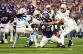 Tight end T.J. Hockenson had the ball ripped out of his hands on Sept. 24 against the Chargers, one of the Vikings’ eight lost fumbles this season.
