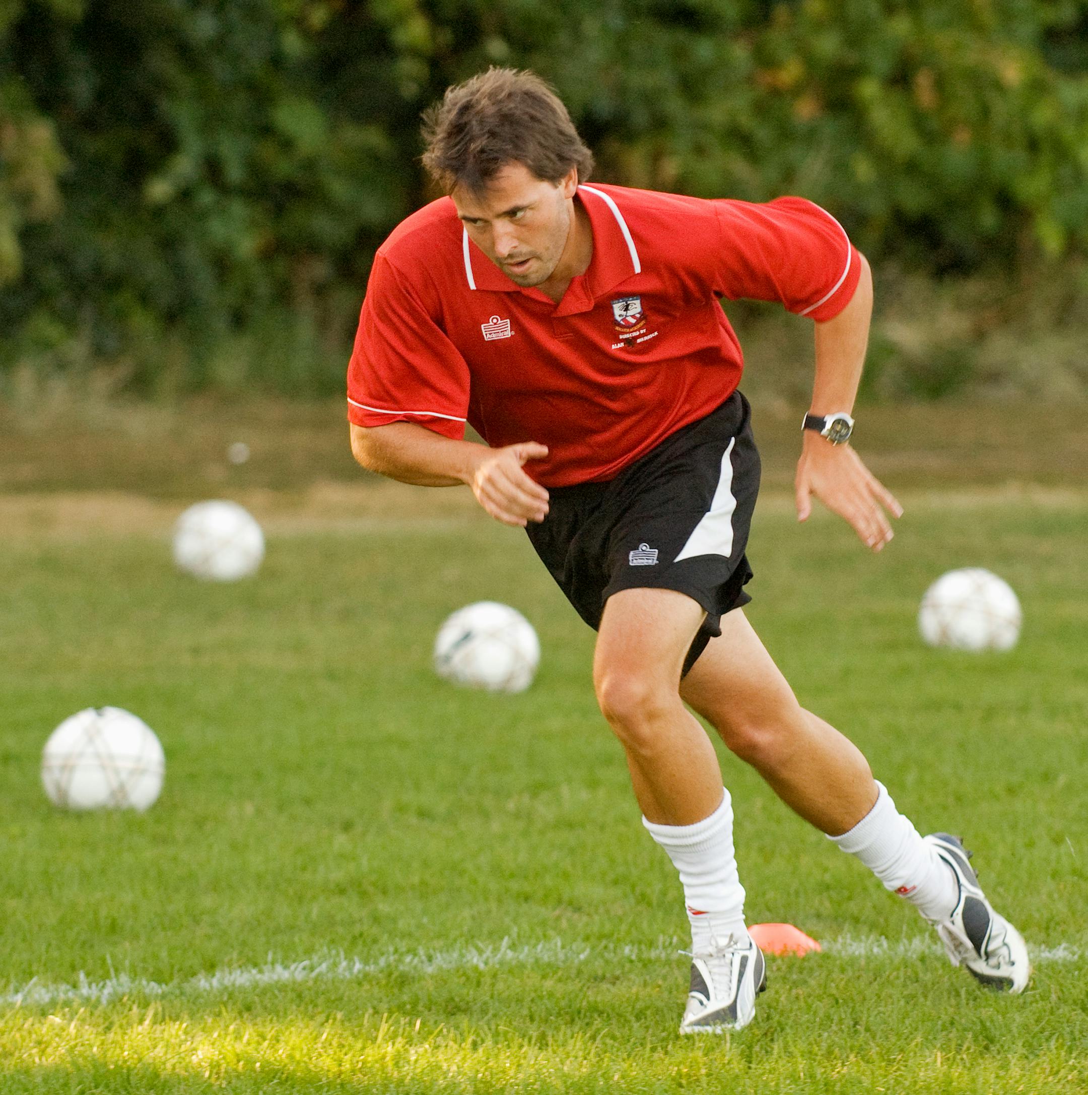 Brady Eichhorn-Hicks ran an exercise drill with the soccer players he coaches at Anoka Ramsey Community College.