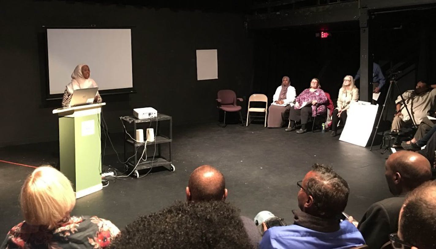 Somali leaders met Wednesday night in Minneapolis with public-health officials to talk about the current measles outbreak in the metro area. Among those presenting information was Asli Ashkir (at podium), a nurse and consultant with the Minnesota Department of Health.