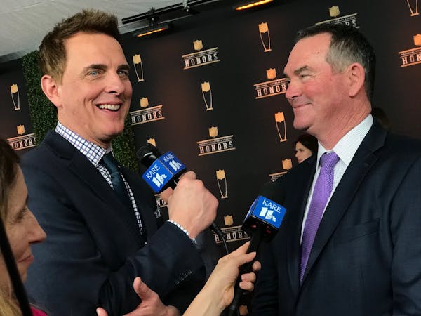Eric Perkins interviews Vikings head coach Mike Zimmer at a Super Bowl NFL Honors red carpet event.
