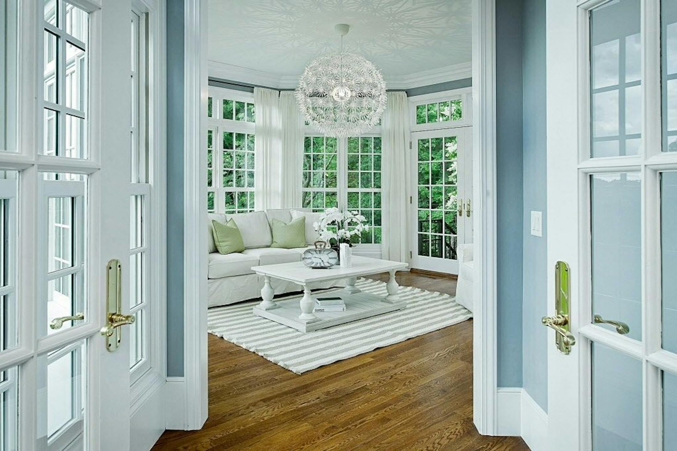 Octagon-shaped sunroom with windows facing south and east.