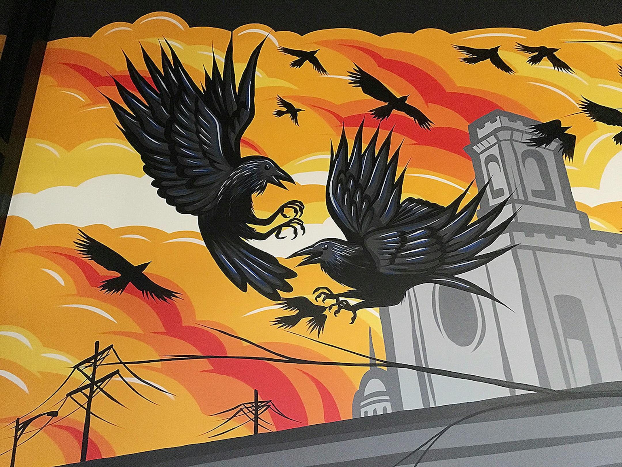 The everywhere artist, Adam Turman, His clean, dynamic murals crawl up the sides of breweries, in elementary schools, the lobby of downtown Minneapolis' hip, new hotel. He boasts T-shirts and pint glasses and posters. He's even created a jigsaw puzzle.