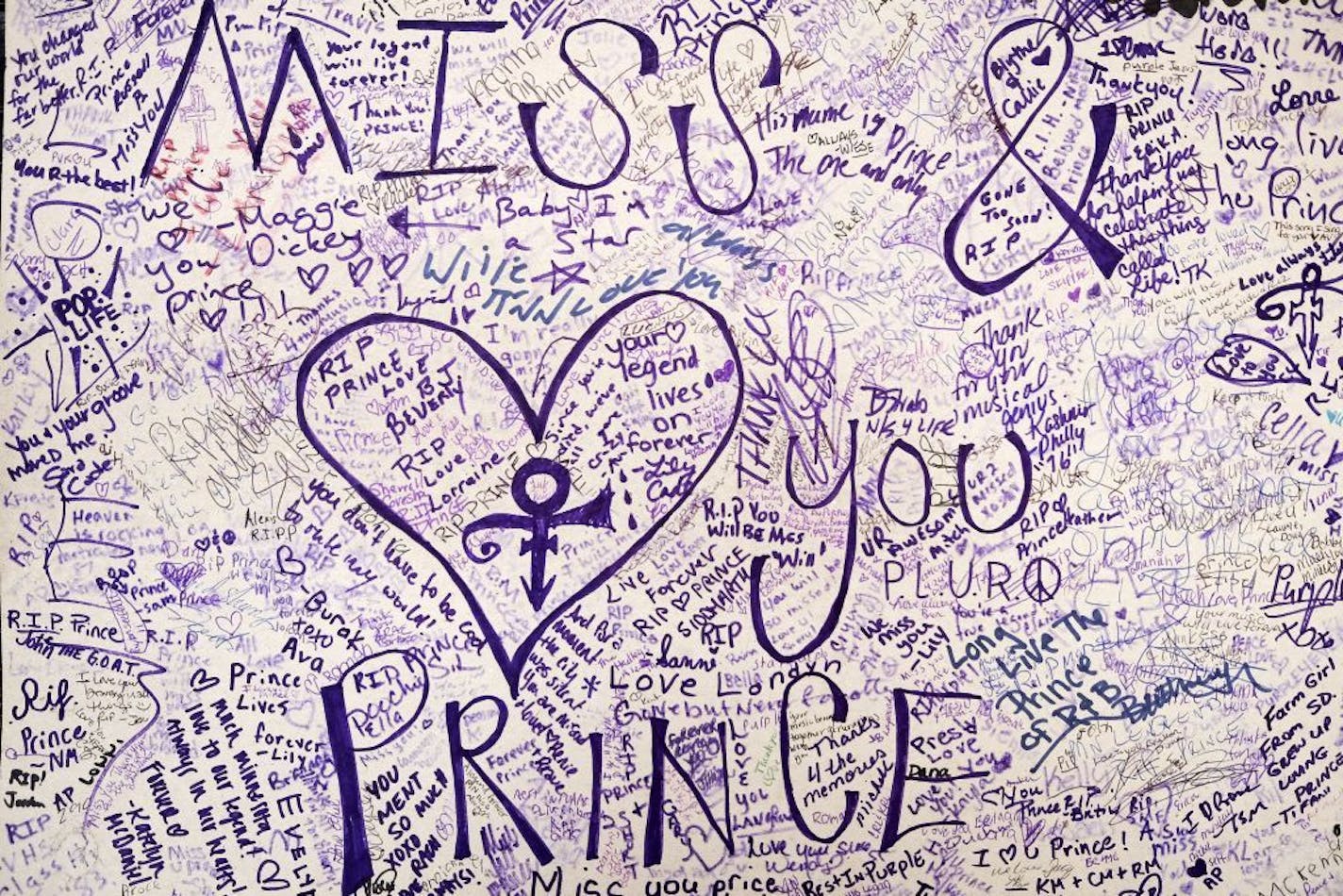 It's been 5 days since the death of Prince rocked Minneapolis and the world. The crowds have dwindled, the rain keeps coming and outpouring of grief has left it's mark on Minneapolis. Here, every inch of a large poster is marked with notes of grief and thanks on the wall outside1st Avenue nightclub in downtown Minneapolis.