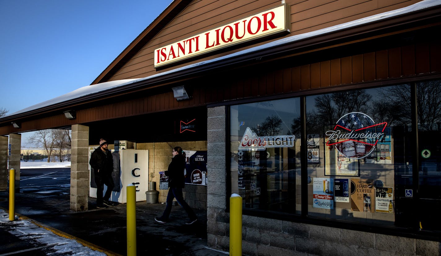 Customers entered and exited Isanti Liquor. When Total Wine came to the Twin Cities and eventually opened 8 stores, many predicted a spate of liquor store closings. Instead a number of municipal and indie liquor store managers say they have partially benefited from Total Wine because of an obscure law that allows any liquor store to sell another retailer's private label wines. ] CARLOS GONZALEZ &#x2022; cgonzalez@startribune.com &#x2013; Blaine, MN &#x2013; January 14, 2020, Isanti Liquor, When