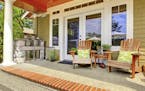 Budget-friendly upgrades such as fresh paint, area rugs and comfortable furniture can revitalize your porch.