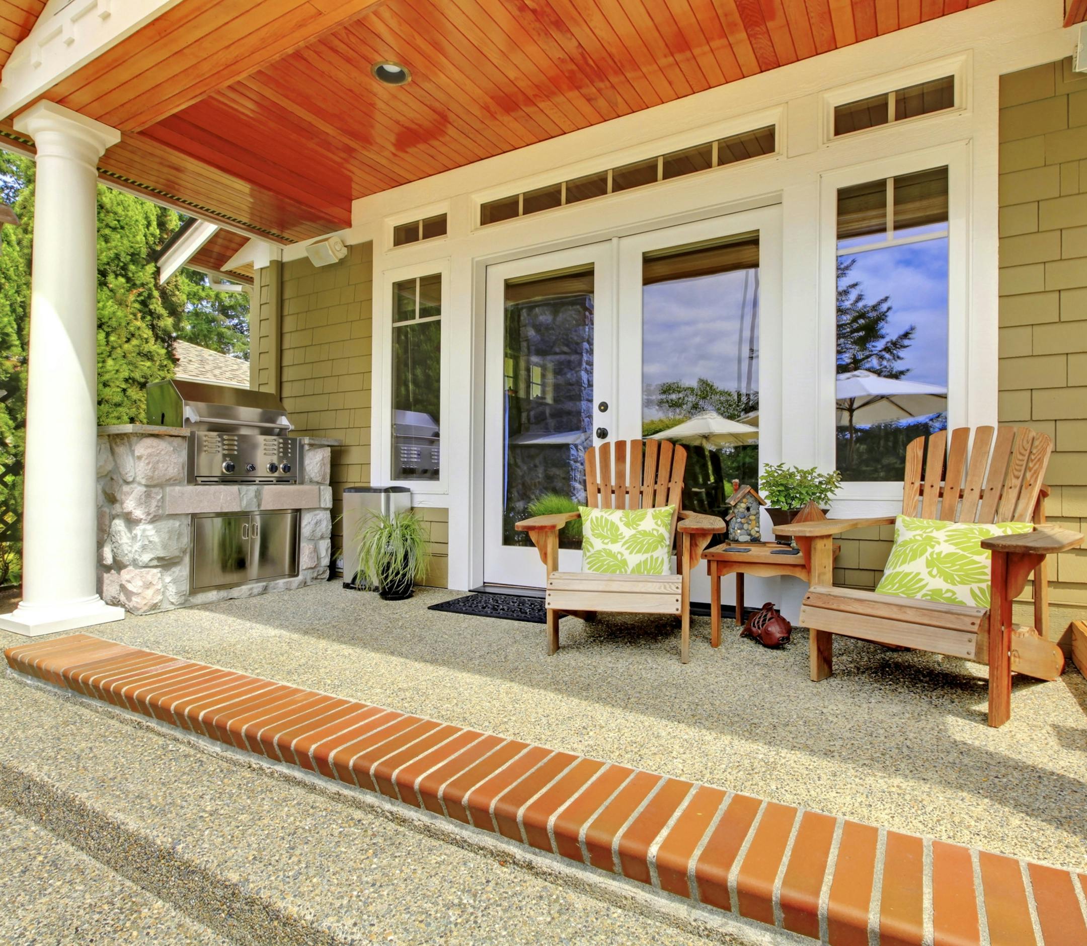 Budget-friendly upgrades such as fresh paint, area rugs and comfortable furniture can revitalize your porch.