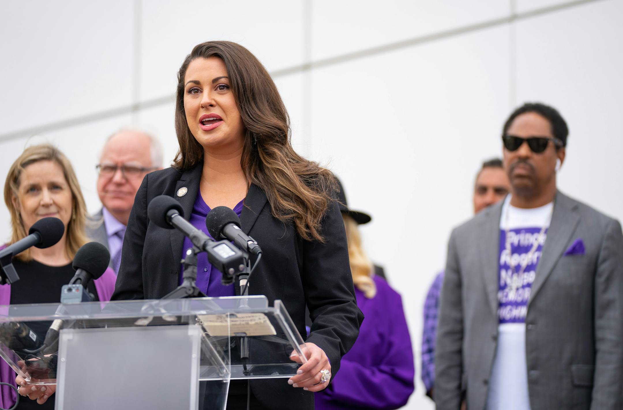 Minnesota state senator Julia Coleman speaks to the press before Governor Tim Walz signs a bi-partisan bill renaming a 7-mile stretch of Highway 5 as "Prince Rogers Nelson Memorial Highway."