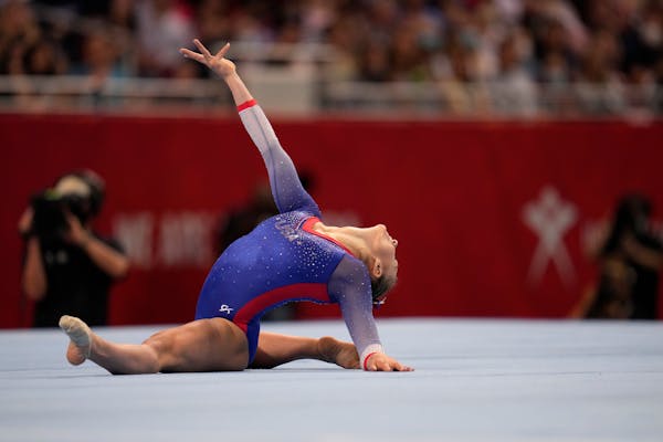 Grace McCallum competes in the floor exercise during the women's U.S. Olympic Gymnastics Trials Friday, June 25, 2021, in St. Louis. (AP Photo/Jeff Ro