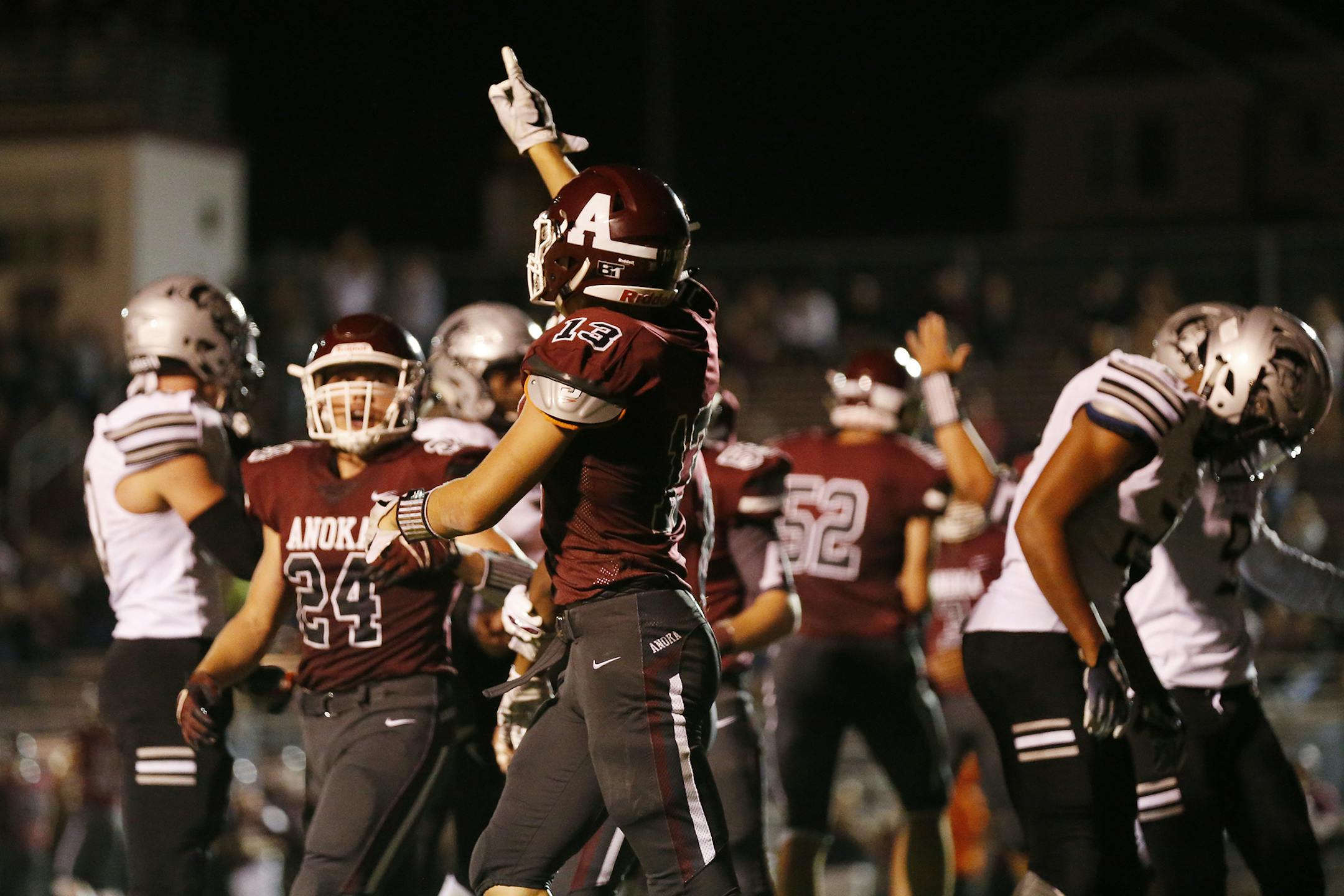 Anoka High School Cody Lindenberg (13) celebrates scoring his team's lone touchdown during the second half. ] LEILA NAVIDI • leila.navidi@startribune.com BACKGROUND INFORMATION: Roseville Area High School plays against Anoka High School in the opening football game of the season in Anoka on Thursday, August 30, 2018. Roseville Area High School won the game 22-7.