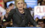 In this June 22, 2016, photo, Democratic presidential candidate Hillary Clinton gestures as she speaks during a rally in Raleigh, N.C. The nation�s 