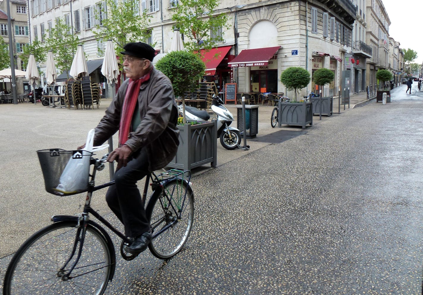 Bringing home bread by bicycle in Avignon.