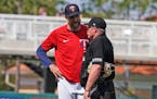 Twins manager Rocco Baldelli talked with an umpire during a game Sunday in Fort Myers, Fla.
