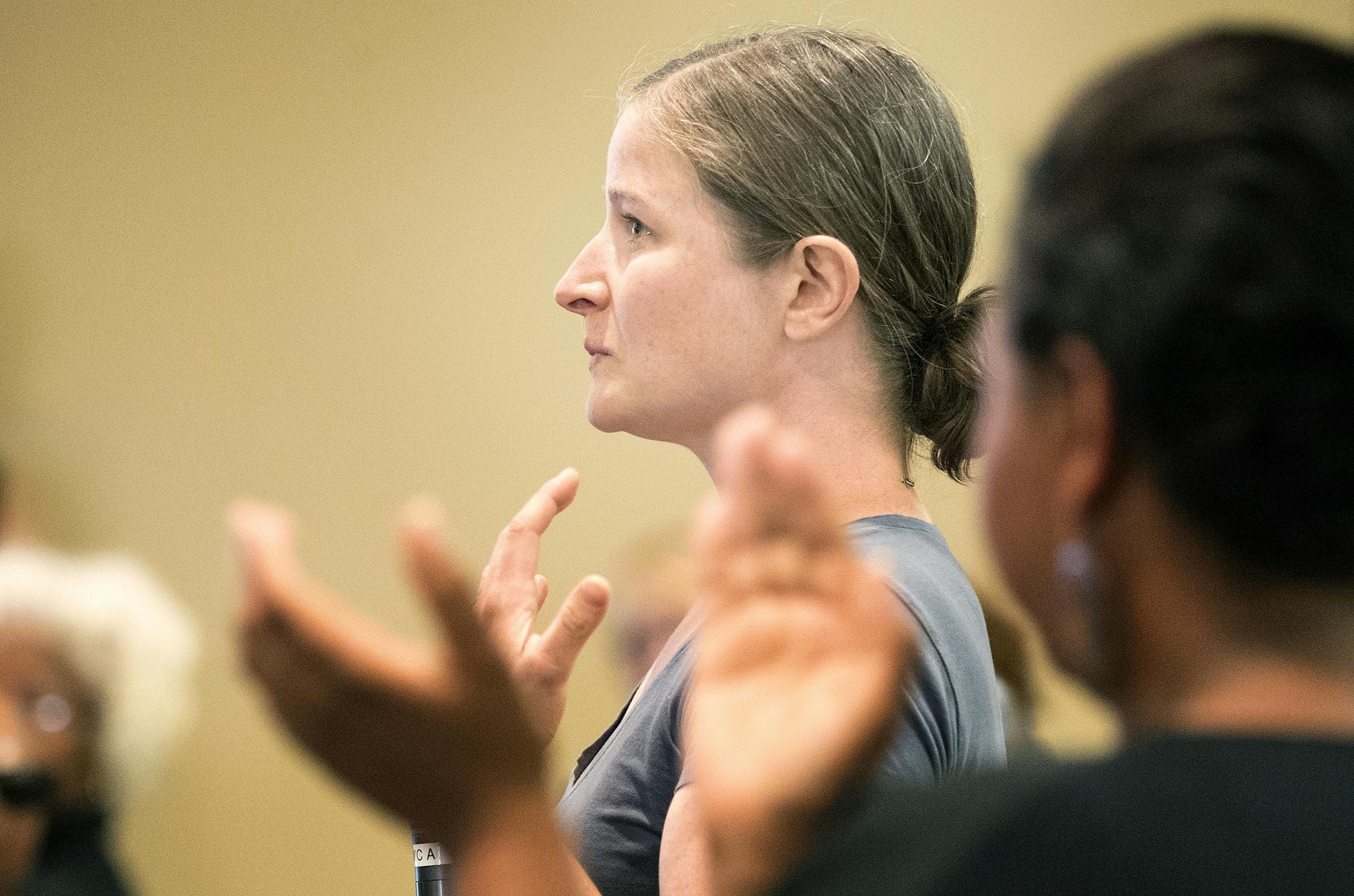Larissa Kiel of St. Paul was applauded while speaking at a community conversation at the Wilder Foundation.