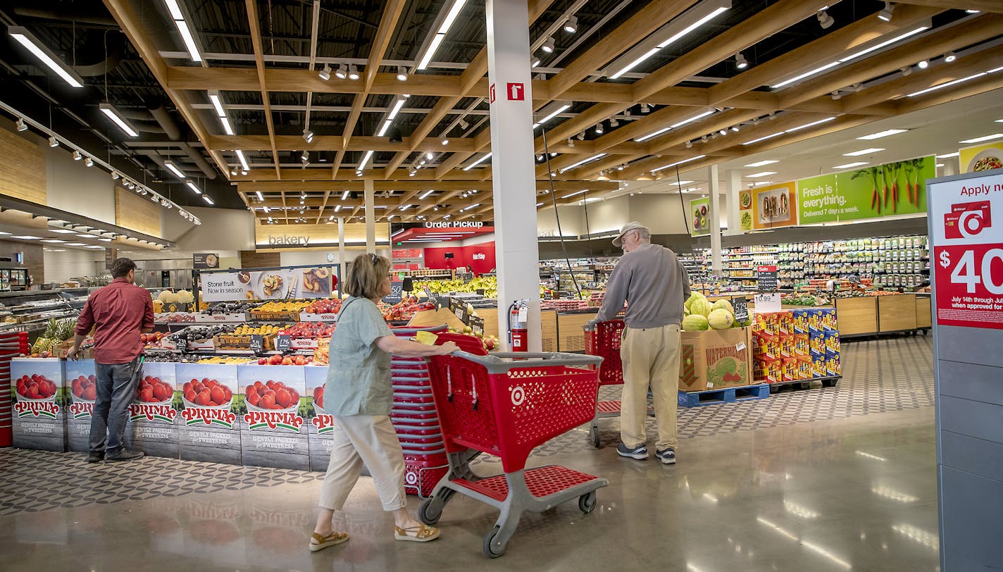 Shoppers made their way through the remodeled grocery area of the Edina Target with her daughter Etta, 2, Thursday, July 18, 2019. Olson said that she now primarily gets her groceries from Target. According to the most recent survey by Chain Store Guide, Target has overtaken Cub Foods as the No. 1 supermarket in the Twin Cities. ] ELIZABETH FLORES • liz.flores@startribune.com