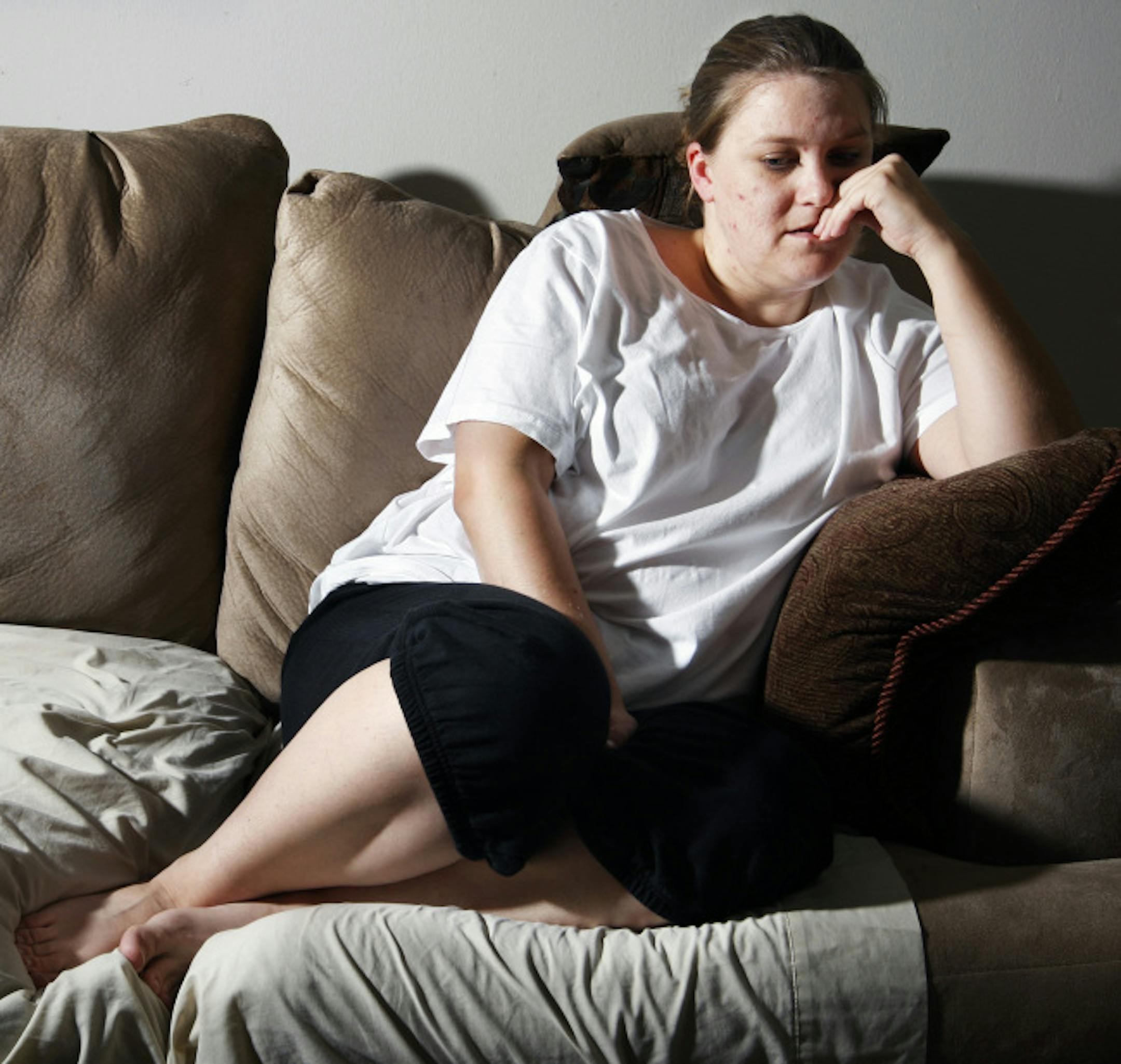 Amy Lindholm, who survived the bridge collapse in Minneapolis sits at home Sept. 18, 2007, in Moundsview, Minn. Many of the survivors are drifting through their days still haunted by what they felt and saw, still struggling to find solace.