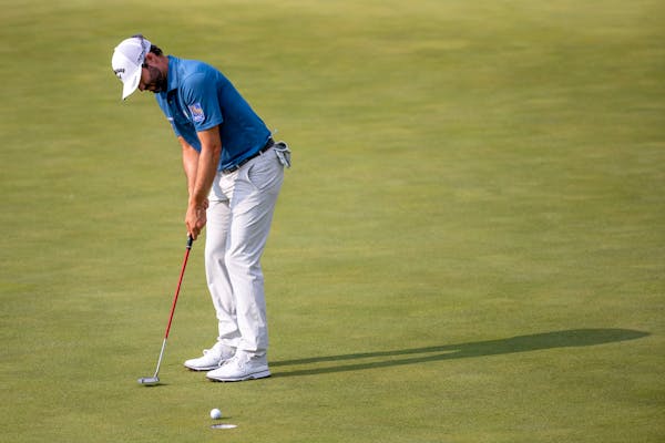 Adam Hadwin made a putt at the ninth hole Friday at the 3M Open.