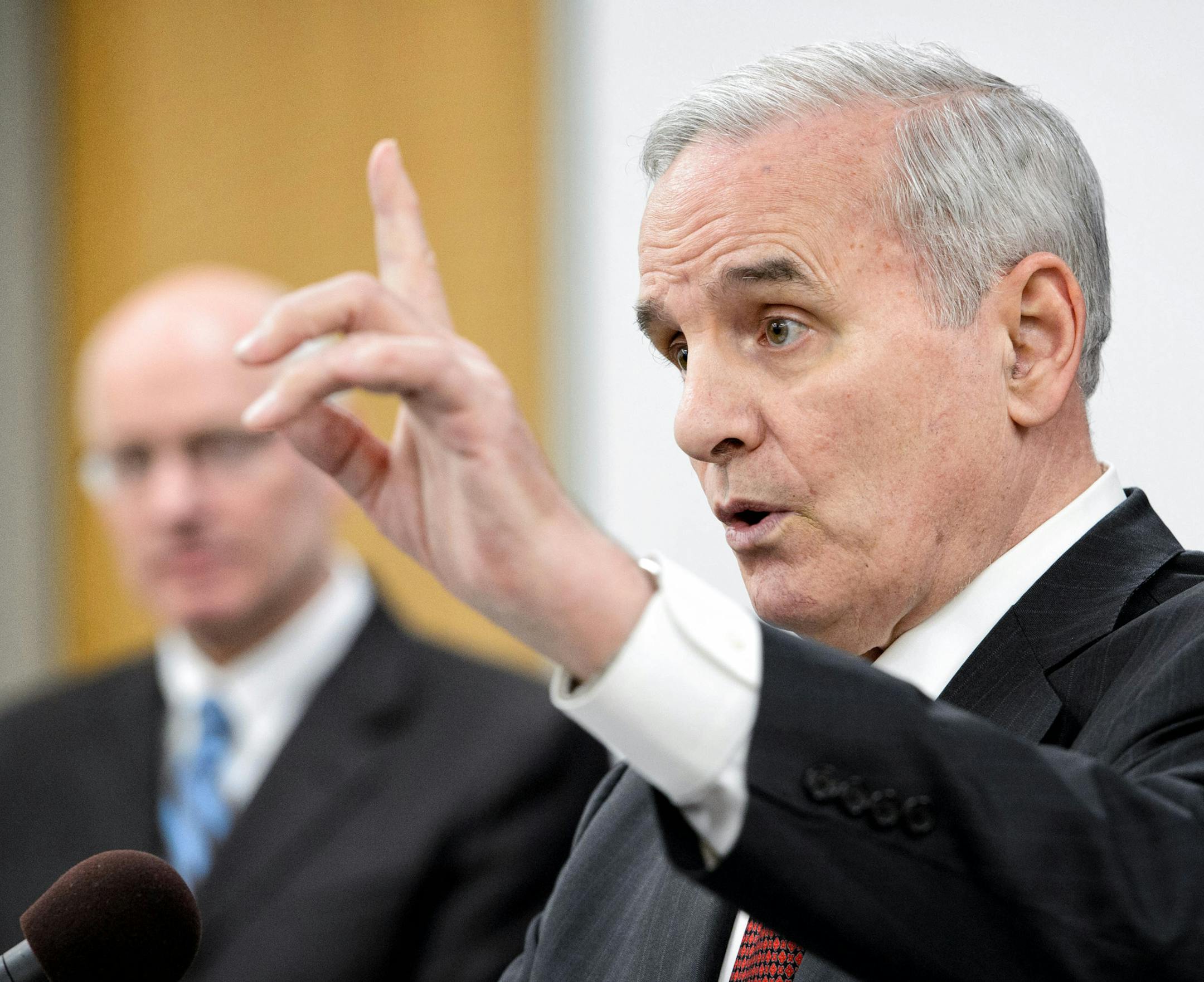 Gov. Mark Dayton on Tuesday called for $842 million in public-oriented construction projects. Minnesota Management and Budget Commissioner Myron Frans is in the background. ] GLEN STUBBE * gstubbe@startribune.com Tuesday, April 7, 2015