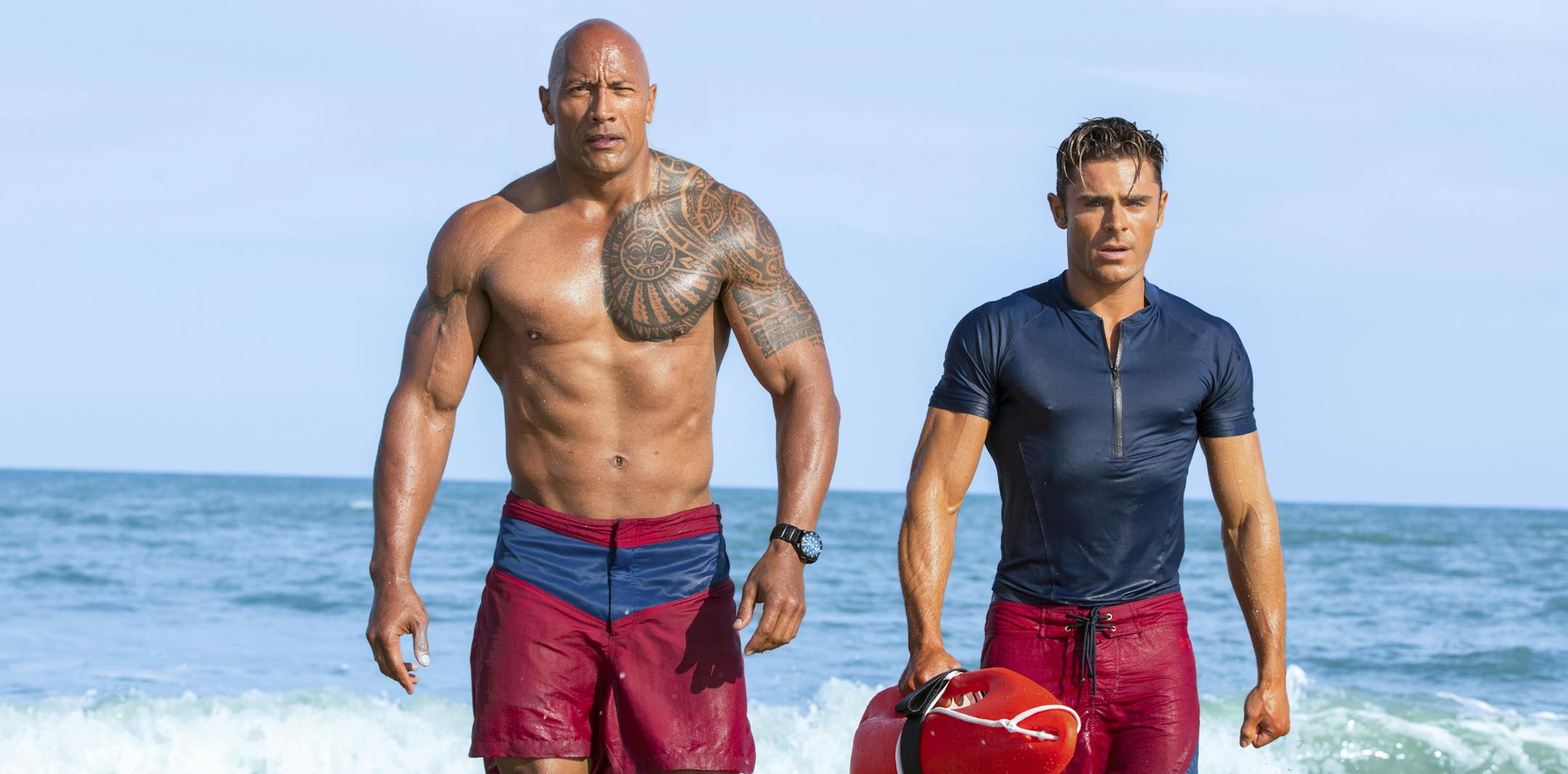 This image released by Paramount Pictures shows Dwayne Johnson, Left, and Zac Efron in a scene from, "Baywatch," in theaters May 25. (Frank Masi/Paramount Pictures via AP)