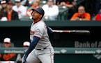 Minnesota Twins' Eduardo Escobar doubles in the first inning of a baseball game against the Baltimore Orioles, Sunday, April 1, 2018, in Baltimore. Jo