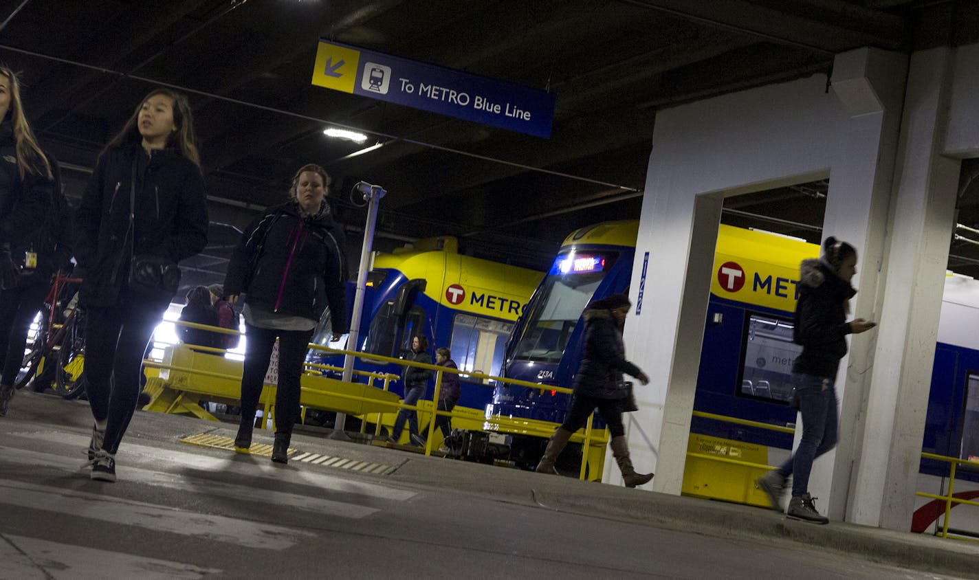 Black Friday Blue Line Metro Transit riders disembark at the Mall of America station in Bloomington November 27, 2015. (Courtney Perry/Special to the Star Tribune)