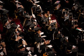 University of Minnesota students sit for the College of Liberal Arts’ graduation ceremony on Sunday in Minneapolis.