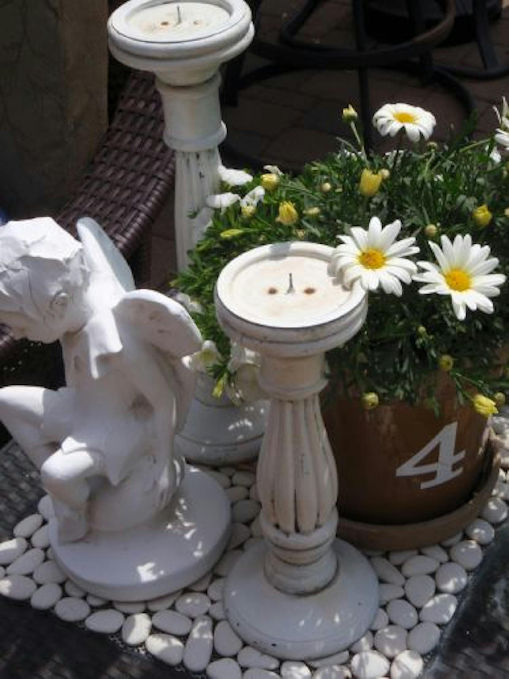Round Barn Potting Co. owner Lori Miller is giving a tour of her Coon Rapids home and garden.