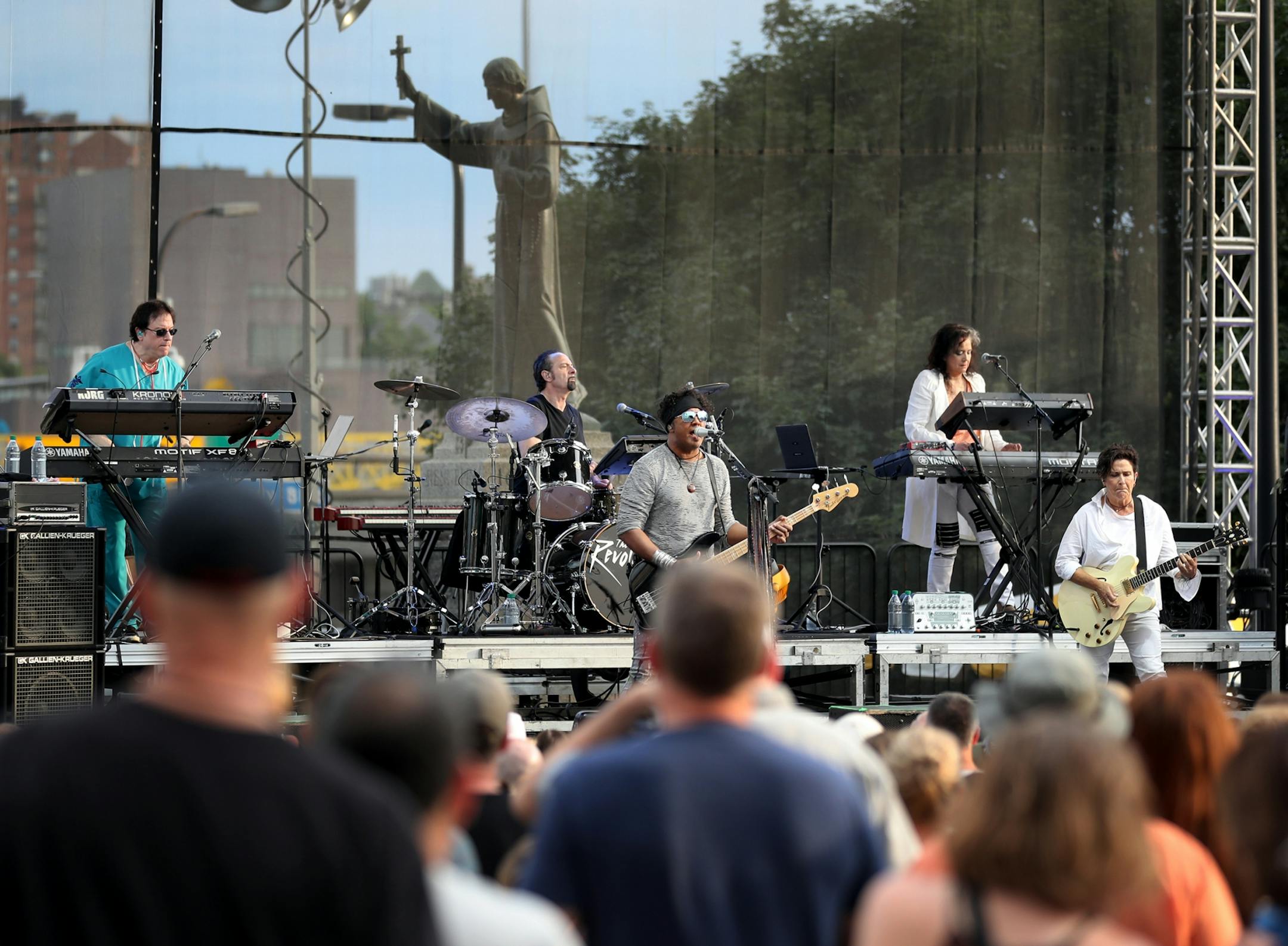 Members of The Revolution jammed during the Basilica Block Party at the Basilica of St. Mary Friday, July 6, 2018, in Minneapolis, MN.