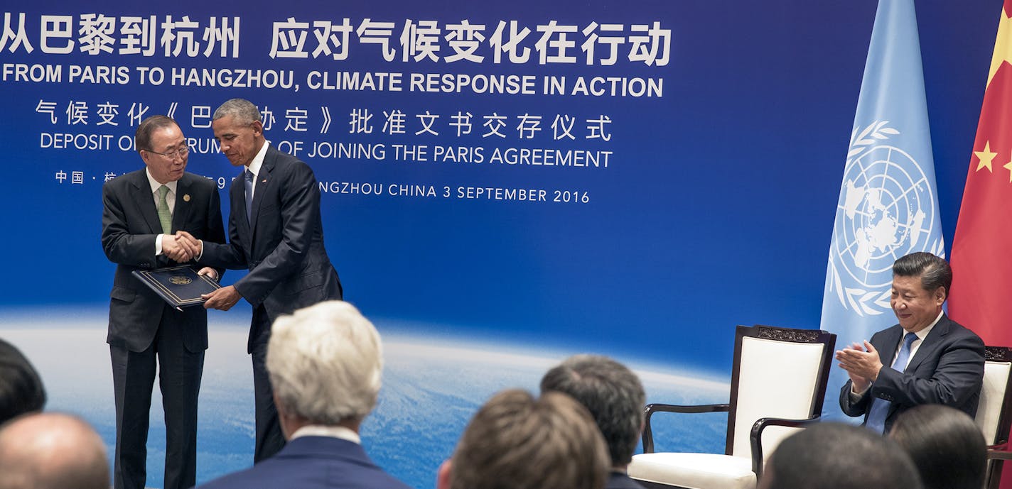 FILE &#xf3; President Barack Obama shakes hands with United Nations Secretary General Ban Ki-moon at a summit where the United States and China formally committed to the Paris climate agreement, in Hangzhou, China, Sept. 3, 2016. White House sources say President Donald Trump is expected to withdraw from the landmark accord, the New York Times reported on May 31, 2017. (Stephen Crowley/The New York Times)