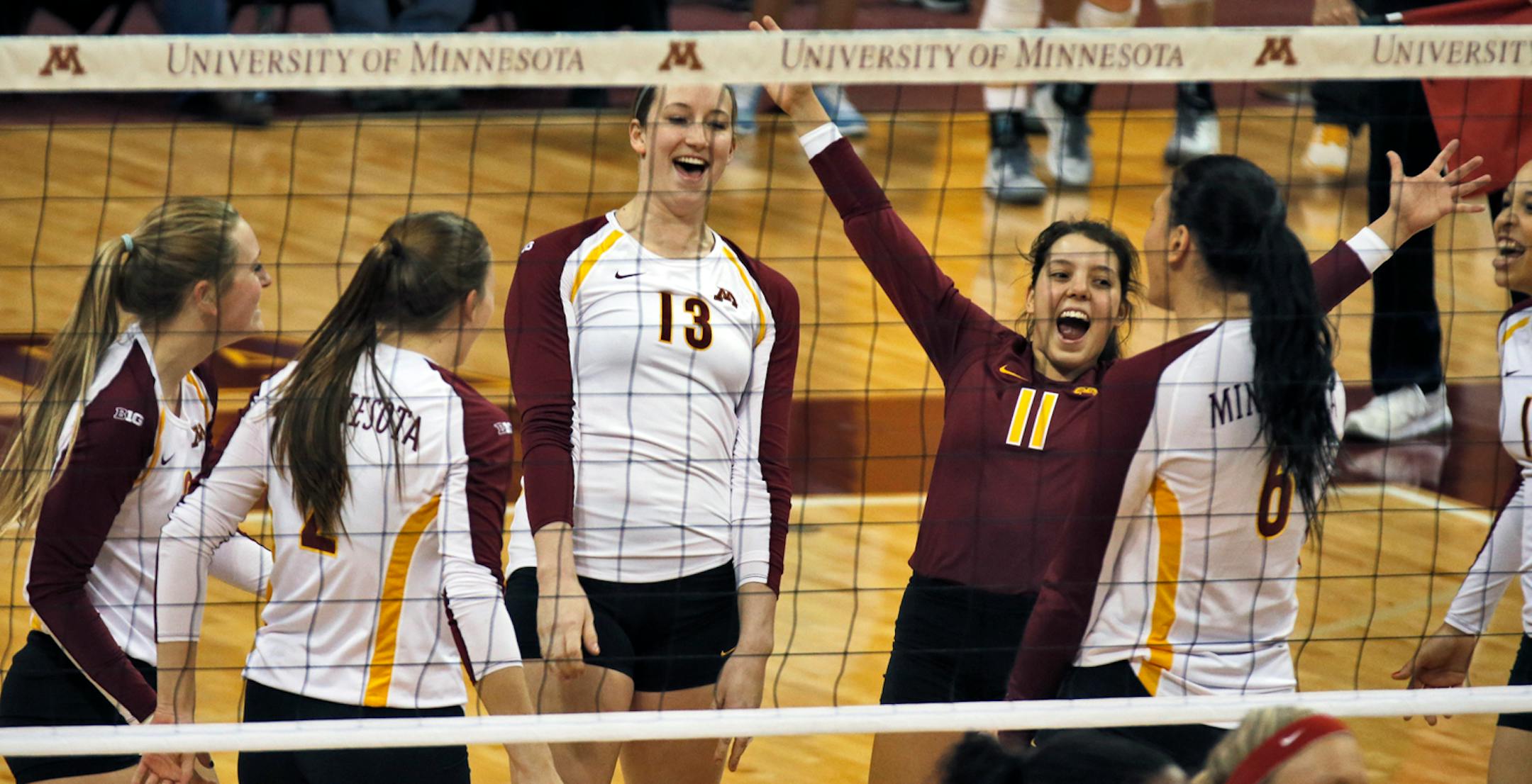 Minnesota won 3-0 over Radford on Friday night. Minnesota players celebrated winning a point.