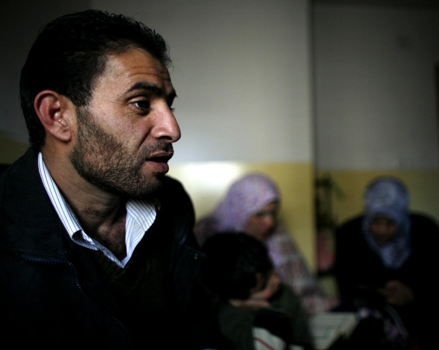 Palestinian Bassam Aramin sits in the bedroom of his ten-year-old daughter Abir Aramin at the family home in the West Bank village of Anata, near Jerusalem, Saturday, Jan. 20, 2007. Hope is getting Aramin through the worst days of his life. The Palestinian peace activist is mourning his 10-year-old daughter, killed in a clash with Israeli border police this week, but is drawing strength from the embrace of his Israeli friends. Aramin, an ex-Fatah gunman, has been touring Israeli high schools wit