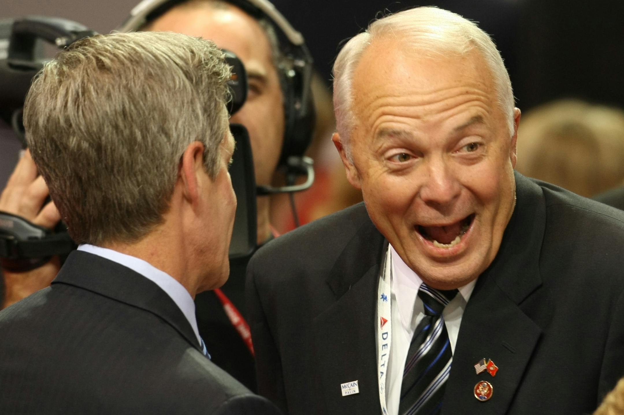 Rep. John Kline shares a laugh with Sen. Norm Coleman on the floor of the convention on Thursday.