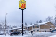 Police and the BCA at the scene where two people were shot and killed Monday night at a Super 8 hotel in Cloquet, Minn., on Tuesday, Jan. 9, 2024. ] E