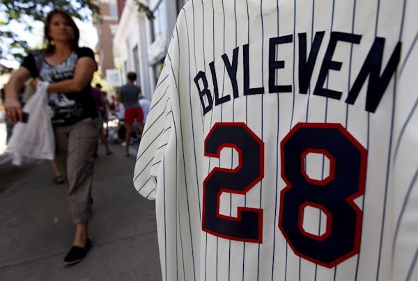 A rack of Bert Blyleven Twins jerseys stood out in a sidewalk display of a memorabilia shop in Cooperstown, N.Y., on Friday. Blyleven will be inducted
