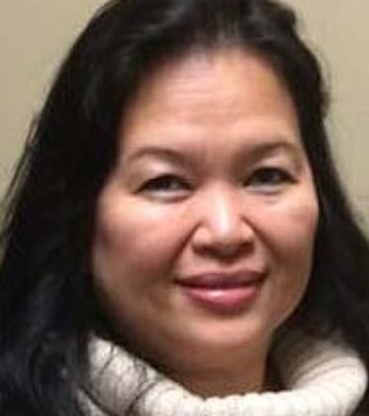 St. Paul police identified the woman struck and killed by a minivan Tuesday as Channy Kek of Eagan.