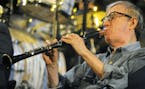 U.S. film director and actor Woody Allen plays clarinet during a concert of his Band in Prague, Saturday, Dec. 20, 2008. (AP Photo/CTK, Stanislav Zbyn