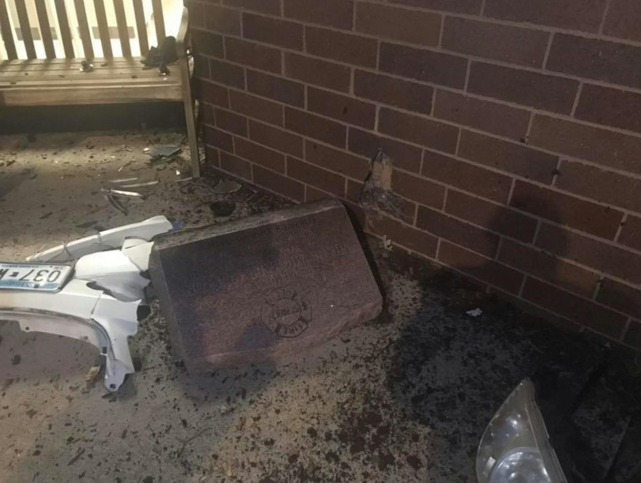 A vehicle hit a memorial erected in honor of Shane Clifton, a firefighter and paramedic who worked at Station 14, outside the Snelling Avenue fire station in St. Paul. The stone itself was not damaged.