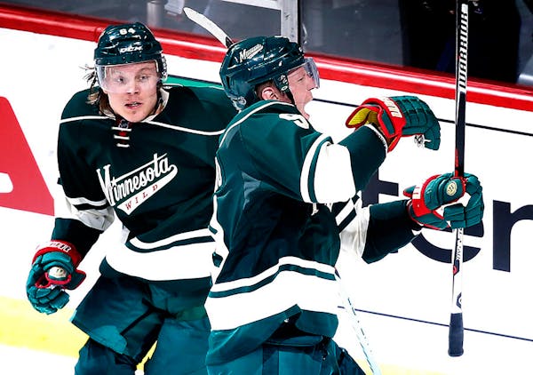 Mikko Koivu (9) celebrated after scoring a goal in the third period of Game 3.