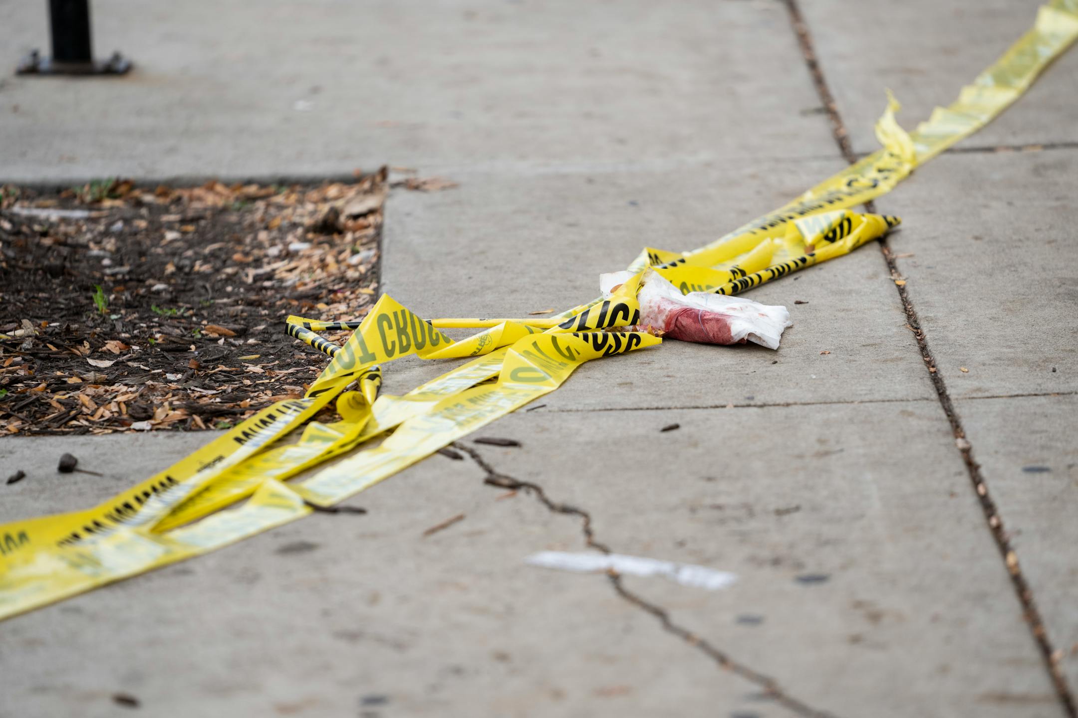 The chaotic scene of a multiple shooting at the bar Truck Park in St. Paul, Minn., on Sunday, October 10, 2021. There appeared to be bloody napkins on the sidewalk.