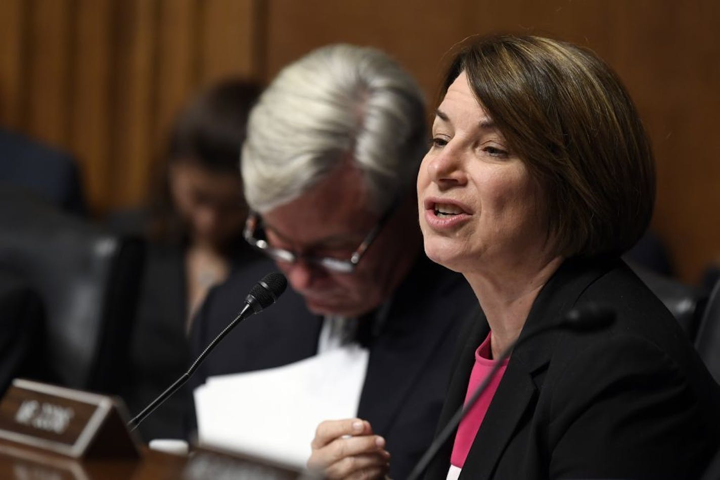 Sen. Amy Klobuchar, D-Minn., asks a question of FBI Director Christopher Wray as he testifies before the Senate Judiciary Committee on Capitol Hill in Washington, Tuesday, July 23, 2019. Wray's appearance before the committee could be something of a preview of the intense questioning special counsel Robert Mueller is likely to face in Congress the next day.