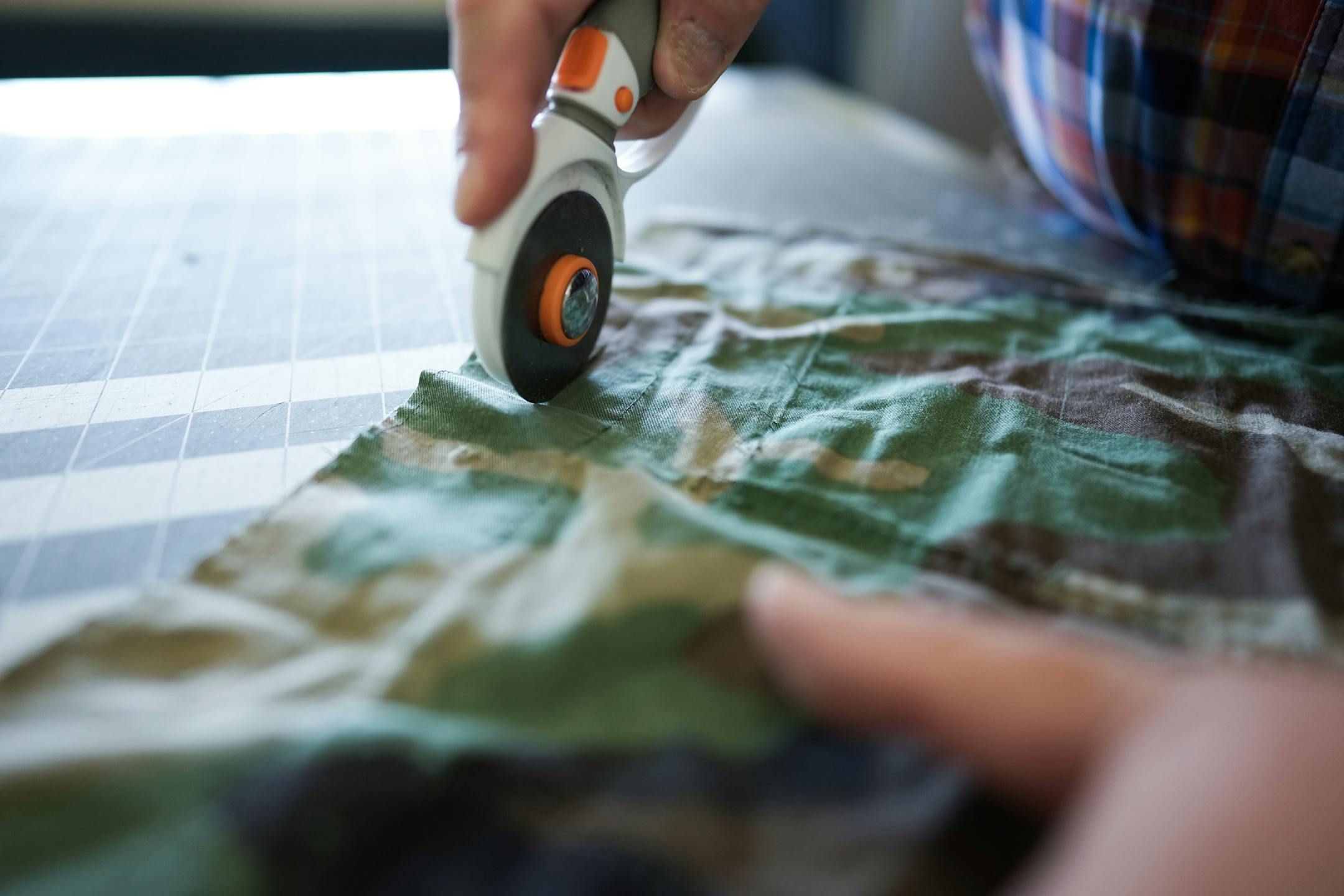 Army veteran and artist Jeffrey Stenbom demonstrated how he weaves American flags using old service member uniforms.