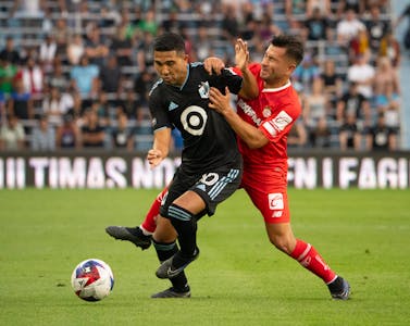 Emanuel Reynoso, left, sees action for Minnesota United against Toluca FC in a 2023 Leagues Cup match at Allianz Field. On Thursday, the Loons sent hi