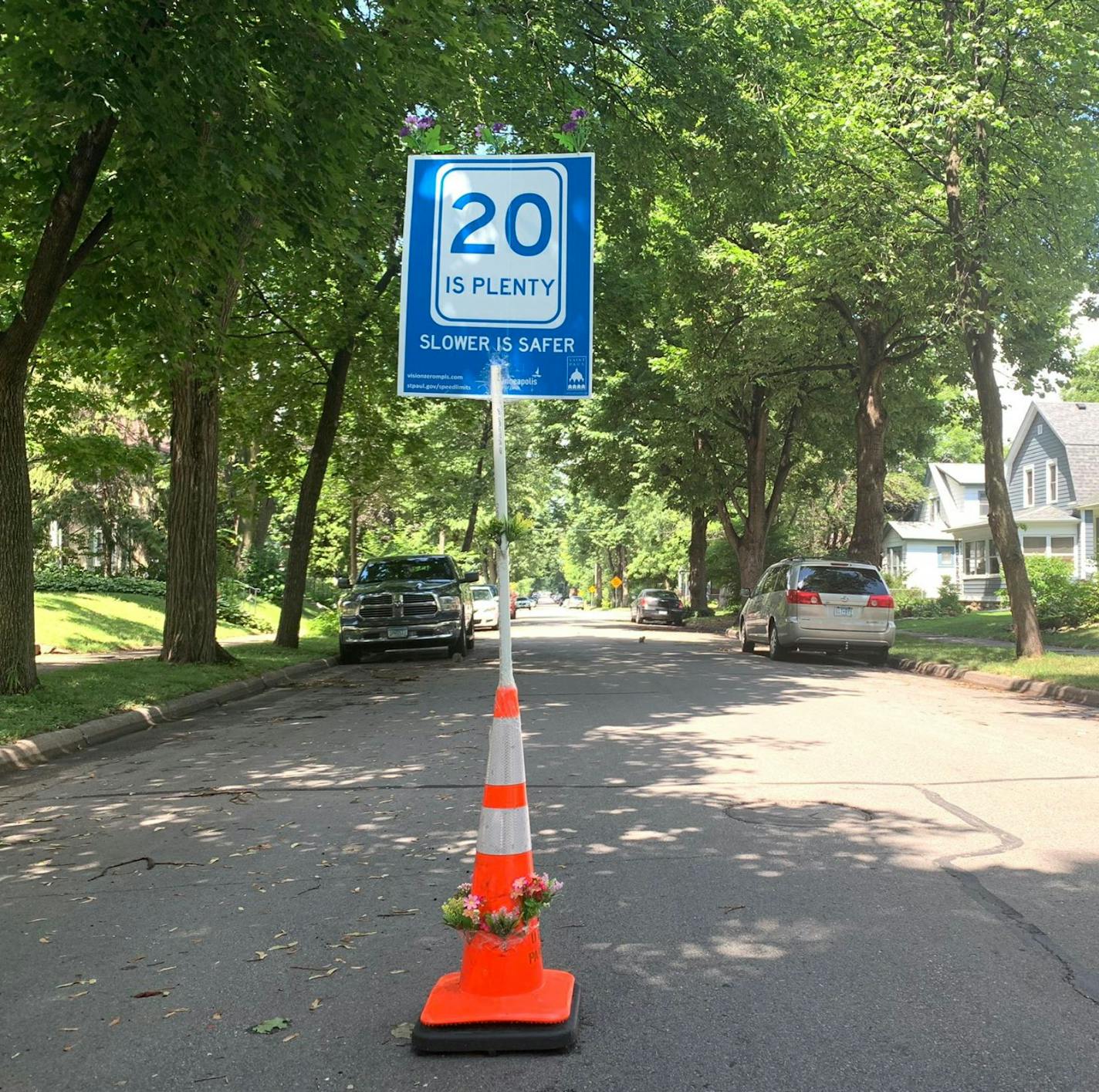 Residents along S. Garfield Avenue near W. 34th Street in Minneapolis attached a "20 is Plenty" sign to a pylon and placed it in the middle of the street to get driver's attention and slow down.