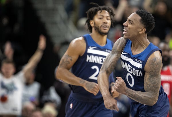 Minnesota Timberwolves Jeff Teague (0) reacted after making a three pointer in the fourth quarter.