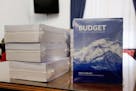 Copies of the President Barack Obama's fiscal 2017 federal budget are displayed in the House Budget Committee Room on Capitol Hill in Washington, Tues