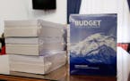 Copies of the President Barack Obama's fiscal 2017 federal budget are displayed in the House Budget Committee Room on Capitol Hill in Washington, Tues