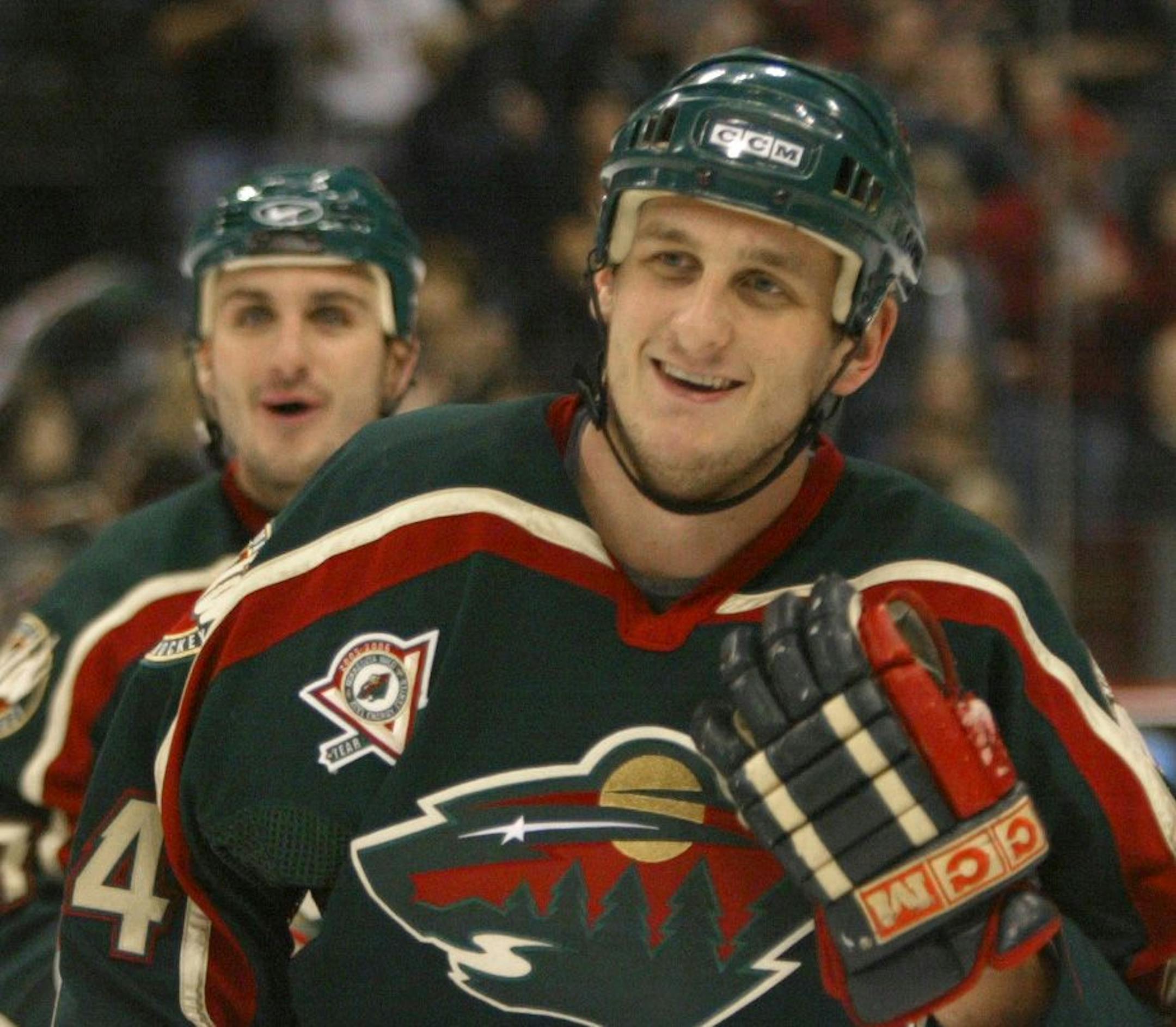 Derek Boogaard was all smiles after he scored his first NHL goal in 2005
