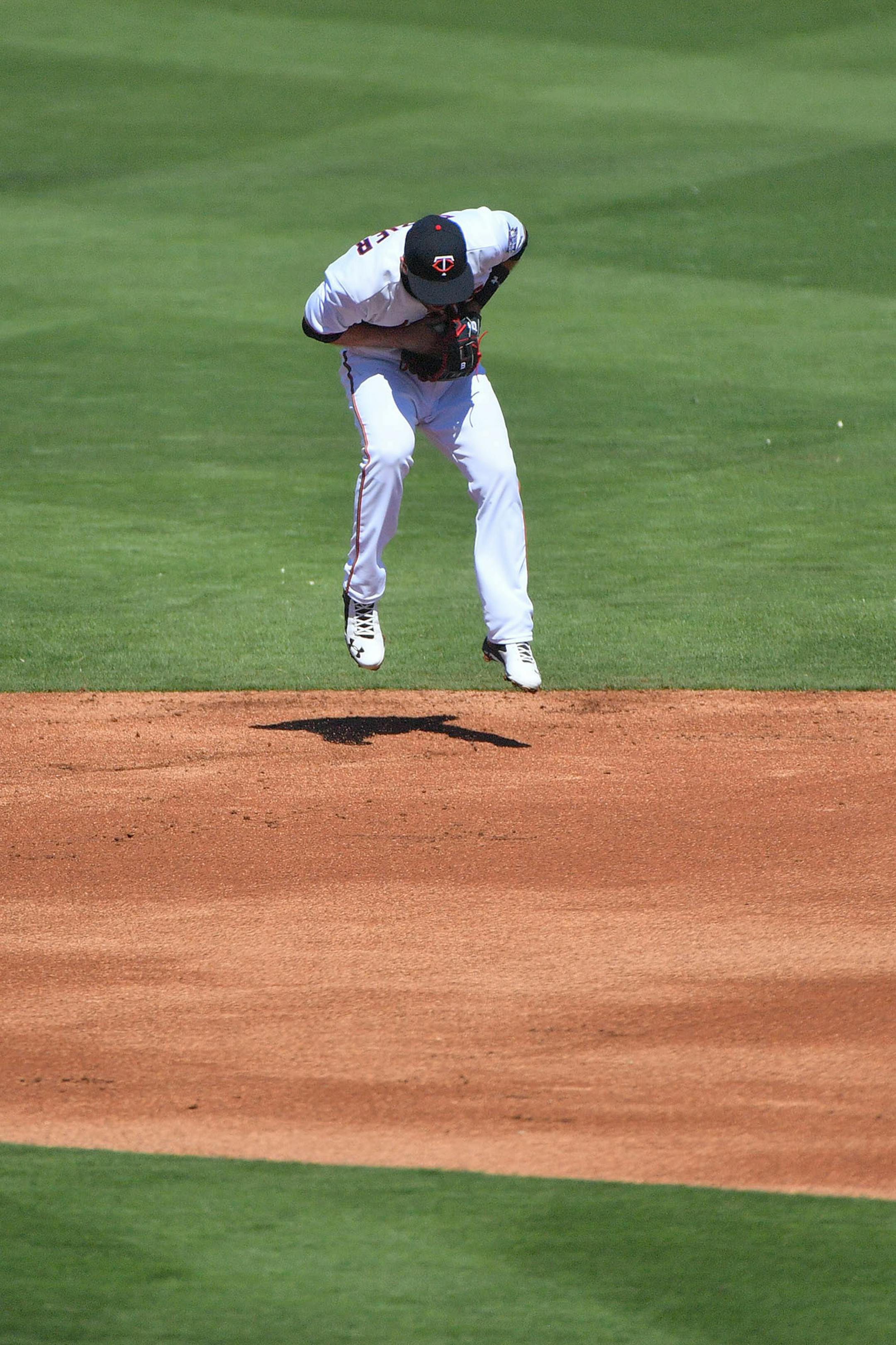 Twins infielder Erick Aybar (0) caught a ground ball in the second inning.